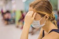 Coronavirus in the hospital covid 19. Woman in a medical mask Patients In Doctors Waiting Room Royalty Free Stock Photo