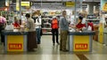 PRAGUE, CZECH REPUBLIC, JUNE 22, 2020: Coronavirus mask face cash register shopping carts food center, payment money