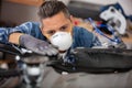 coronavirus mechanic working wearing mask Royalty Free Stock Photo