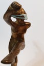 Coronavirus metaphore vintage brass statue dancer girl Royalty Free Stock Photo