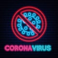 Coronavirus neon sign quarantine coronavirus epidemic. Bright night neon sign against the background of a brick wall