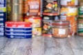 Coronavirus outbreak. Blurred image of stack of canned foods with a long shelf life such as fish, vegetables and meat stew,