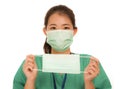 Coronavirus outbreak in China - young beautiful Asian Korean medicine doctor woman or hospital nurse recommend use of protective Royalty Free Stock Photo