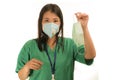 Coronavirus outbreak in China - young beautiful Asian Korean medicine doctor woman or hospital nurse recommend use of protective Royalty Free Stock Photo