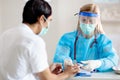 Coronavirus outbreak. Doctor and covid-19 patient Royalty Free Stock Photo