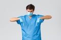 Coronavirus outbreak, healthcare workers fighting disease, hospitals concept. Disappointed doctor showing compassion or
