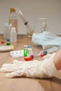 coronavirus outbreak, Virus and recovery concept, there are hands with gloves, vaccine bottles with red or green liquid, surgery Royalty Free Stock Photo