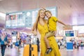 Coronavirus is over. Quarantine weakened. Take off the mask. Now you can travel. Family at airport before flight. Mother Royalty Free Stock Photo