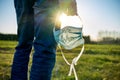 Coronavirus is over we won concept man holding a his mask with we won sign noutdoor in the sunshine freedome Royalty Free Stock Photo