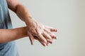 Coronavirus pandemic prevention.Close up man wash hands with soap warm water and , rubbing fingers washing frequently Royalty Free Stock Photo