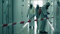 Coronavirus pandemic, virus prevention, COVID-19 concept. Hall is getting decontaminated by workers in hazmat suits