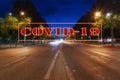Coronavirus in Paris, France. Covid-19 sign. Concept of COVID pandemic and travel in Europe. Champs-Elysees avenue Royalty Free Stock Photo