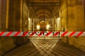 Coronavirus in Paris, France. COVID-19 sign. Concept of COVID pandemic and travel in Europe. The Louvre Palace Royalty Free Stock Photo