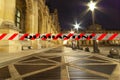 Coronavirus in Paris, France. Quarantine sign. Concept of COVID pandemic and travel in Europe. The Louvre Palace by night Royalty Free Stock Photo