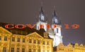 Coronavirus in Prague, Czech Republic. The gothic Church of Mother of God in front of Tyn in Old Town Square. Covid-19 sign. Royalty Free Stock Photo