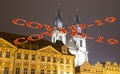 Coronavirus in Prague, Czech Republic. The gothic Church of Mother of God in front of Tyn in Old Town Square. Covid-19 sign. Royalty Free Stock Photo