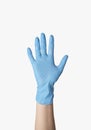 Coronavirus protection. Female doctor showing hand in rubber glove on white background, isolated. Closeup view Royalty Free Stock Photo