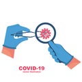 Coronavirus research concept. Doctor holds coronavirus bacterium with tweezers.