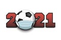2021 and coronavirus sign with soccer ball in mask
