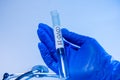 Coronavirus test tube in doctor hand in laboratory, test tube in doctor hand Royalty Free Stock Photo