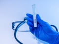 Coronavirus test tube in doctor hand in laboratory, test tube in doctor hand Royalty Free Stock Photo