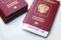 Coronavirus and travel concept. Note COVID-19 and Russian passport. Novel corona virus outbreak. Spread of epidemic from China Royalty Free Stock Photo