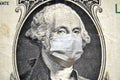 Coronavirus in USA, President Washington with face mask on dollar money bill. COVID-19 affects global stock market Royalty Free Stock Photo