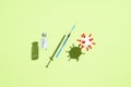 Coronavirus vaccination concept. Vial vaccine, medical syringe, and white ball in form virus