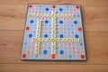 Coronavirus warning spelt out in four languages on scrabble board