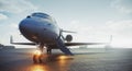 Corporate business class jet airplane parked at airfield and waiting vip persons for take off. Luxury tourism and Royalty Free Stock Photo