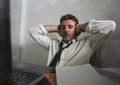 Corporate business lifestyle portrait of stressed and exhausted businessman working frustrated at office computer desk overworked Royalty Free Stock Photo