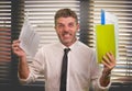 Corporate business and office lifestyle portrait of young attractive stressed and upset executive man working busy under stress Royalty Free Stock Photo