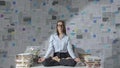 Corporate businesswoman practicing meditation in the office