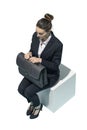 Corporate businesswoman sitting and waiting