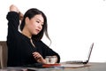 Corporate company portrait of young beautiful and busy Asian Chinese business woman working at office computer desk concentrated i Royalty Free Stock Photo