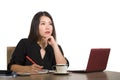 Corporate company portrait of young beautiful and busy Asian Korean businesswoman working at office computer desk concentrated in Royalty Free Stock Photo