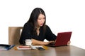 Corporate company portrait of young beautiful and busy Asian Korean businesswoman working at office computer desk concentrated in Royalty Free Stock Photo