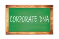 CORPORATE DNA text written on green school board