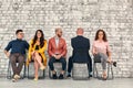 Corporate employees. Business matters discussion. Solid team ignoring lonely colleague. Royalty Free Stock Photo