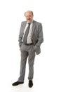 Corporate full body portrait bald 60s happy and confident business posing neat and tidy smiling happy isolated on white