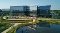 Corporate Headquarters with Reflective Water Features and Greenery