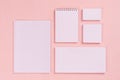 Corporate identity template, white stationery set with blank business cards, stickers, notepad on pink background. Royalty Free Stock Photo