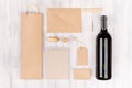 Corporate identity template for wine industry, blank brown kraft packaging, stationery, merchandise set with bottle red wine on s Royalty Free Stock Photo