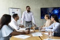 Corporate Meeting. Group Of Multiethnic Business People Having Conference In Modern Office Royalty Free Stock Photo