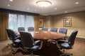 corporate meeting room with roundtable and chairs for discussions