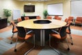 corporate meeting room with roundtable and chairs for discussions
