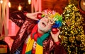 Corporate party. christmas tree decoration. Going crazy. xmas gifts. Time for presents. party man in clown wig. new year