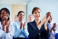 Corporate, people and applause for presentation at conference, workshop or seminar in New York. Diverse group, female Royalty Free Stock Photo