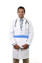 Corporate portrait of confident 40s attractive male medicine doctor with stethoscope with clipboard Royalty Free Stock Photo