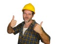 Corporate portrait of construction worker - attractive and happy builder man in safety helmet smiling confident posing relaxed as Royalty Free Stock Photo